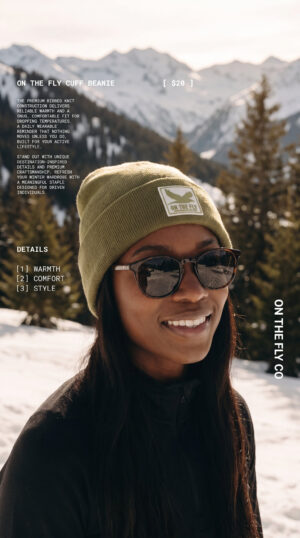 women's green On The Fly cuff beanie with bird rubber patch logo