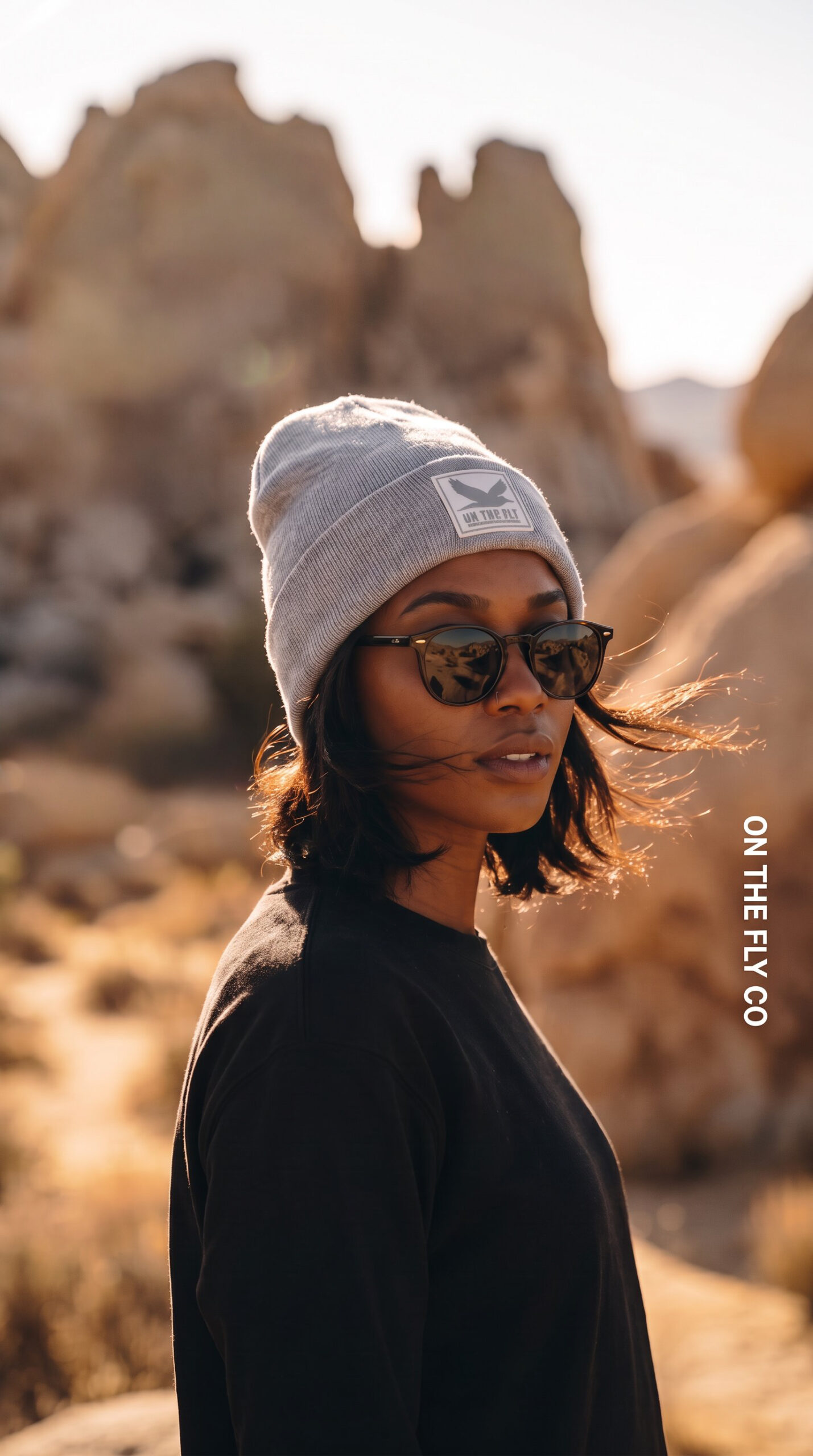 Gray On The Fly cuff beanie with bird rubber patch logo